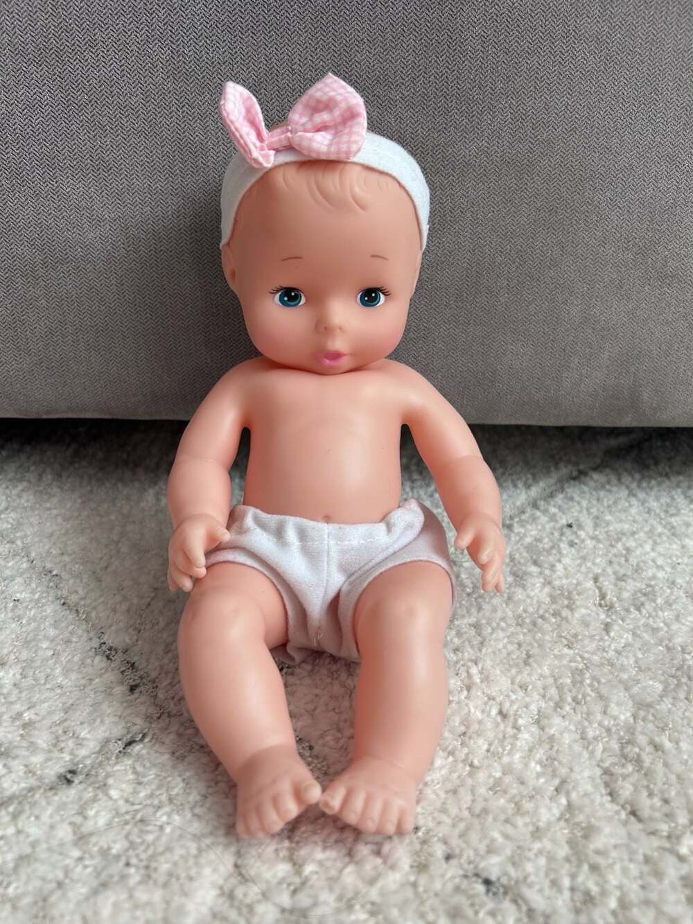 Goldberger Baby's First 10" All Vinyl Baby Doll with Pink Bow Headband